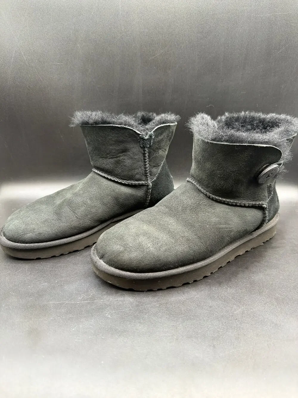 UGG Mini Bailey Button II Black Sheepskin Boots Women’s Size 9 1016422